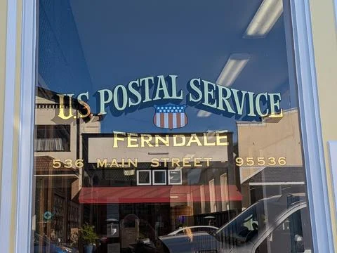 Close-up of window text “U.S. Postal Service Ferndale,” Stock Photos