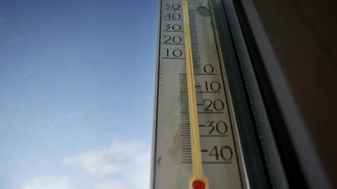 Close Up Window Thermometer Showing Extreme Cold Temperature On Sunny Winter Day Stock Footage 329682499