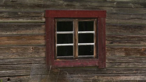 Close-up, a window in a wall of an old log cabin, Sweden Stock Footage 115531203