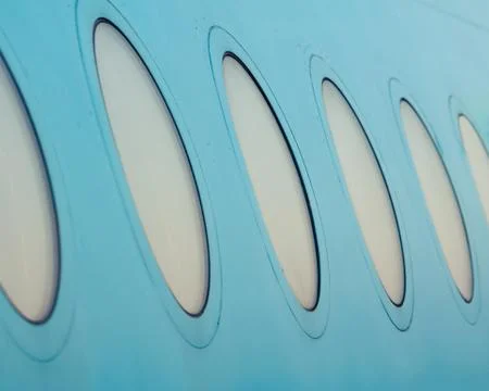 Close-up of the windows of an airplane outside. Stock-Fotos