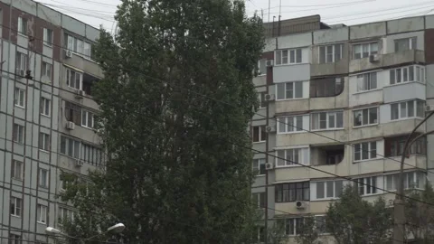 Close-up windows of an old concrete soviet building. Panoramic view of the USSR Vídeos de archivo 219283835