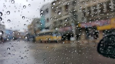 Close up of wing mirror at the car in the raining day. Stock Photos