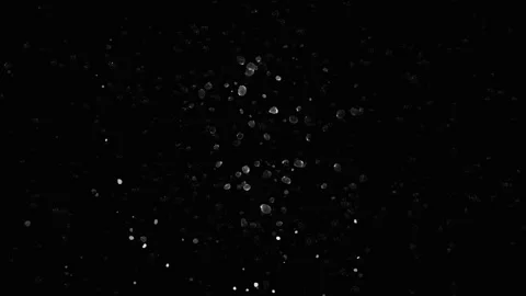 Close up of winter ice crystals particles flying in black space of Stock Footage 138739569