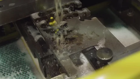 Close-up of the wire - EDM CNC machine while cutting the sample work pieces in Stock Footage 95426797