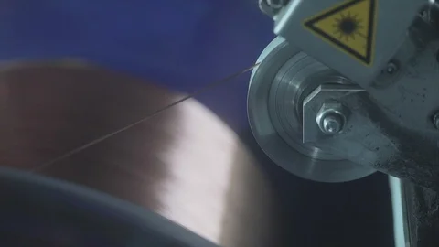 Close-up wire production, copper cable manufacturing process Stock Footage 129895390