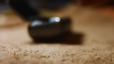 Close-up of wireless earphones in the charging case. Male's hand taking an Stock Footage 144937637