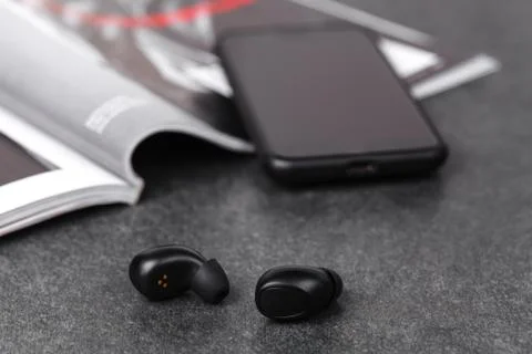 Close up wireless earphones, waterproof for fitnes Foto stock