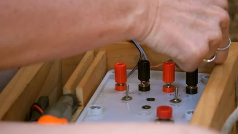 Close-up wiring explosive trigger box for cannon net Stock Footage 104159101