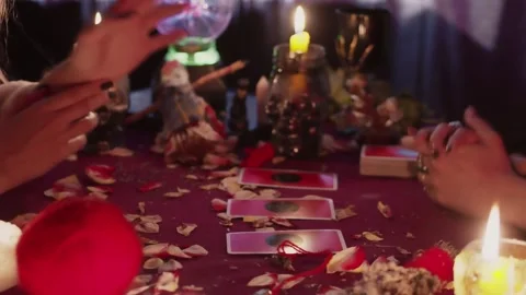 Close up of Witch fortune teller psychic Tells client the future about her Video stock 143516246