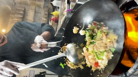 Close up of a wok in slow motion Stock Footage 231552137