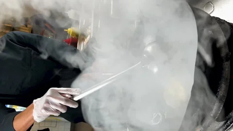 Close up of a wok in slow motion Stock Footage 231552188