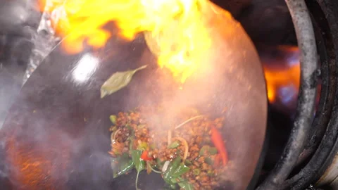 Close up of a wok in slow motion Stock Footage 231552205