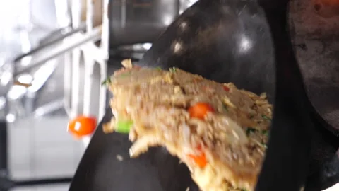 Close up of a wok in slow motion Stock Footage 231552214