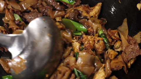 Close up of a wok in slow motion Stock Footage 231552222