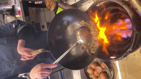 Close up of a wok in slow motion Stock Footage 234926751