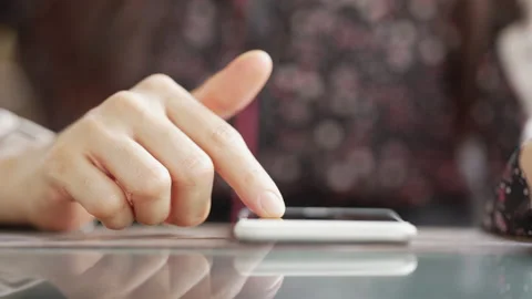 Close up Woman checking email with mobile phone at a coffee shop Stock Footage 152610170