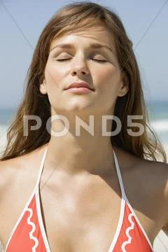 Close-Up Of A Woman Day Dreaming