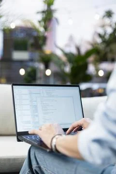 Close up of woman displaying source code with programming language Fotos Stock