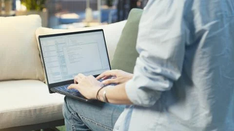Close up of woman displaying source code with programming language Stock Photos