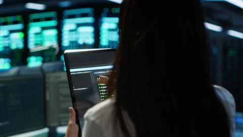 Close up of woman doing maintenance in server room using tablet Video stock 280722742