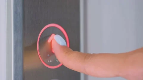 Close up: woman finger pressing elevator up button - moving up concept Video stock 144913673