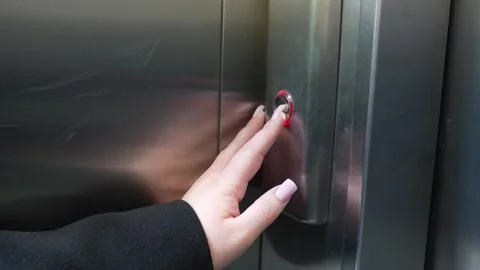 Close up of woman hand pressing elevator call button on stainless steel panel 스톡 동영상 331929298