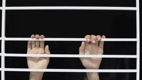 Close up woman hand touching cage. Stock Footage 93774009