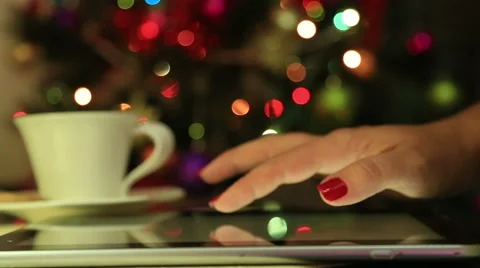 Close up of a woman hand using a digital tablet Stock Footage 57629402