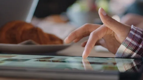 Close up woman hand using digital tablet computer browsing online social media Stock Footage 103479684