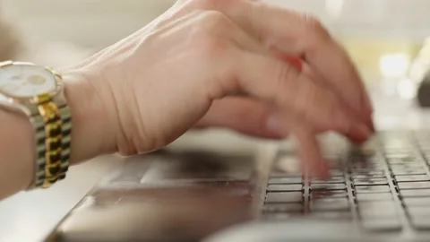 Close up woman hand using keyboard laptop on white table background. Stock Footage 131579885