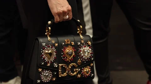 close up woman with a handbag Dolce & Ga... | Stock Video | Pond5