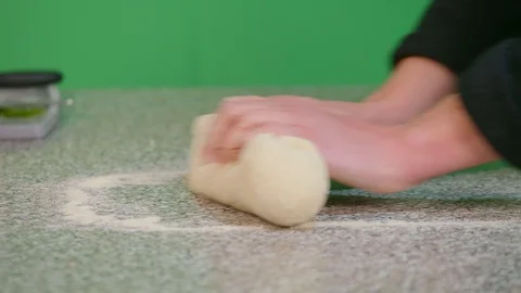 Close up of woman hands while prepare dough for vegetarian food - green screen Stock Footage 126251583