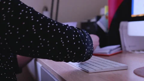 Close-up woman hands working on a computer Stock Footage 228874494