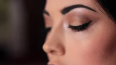 Close-up of woman looking at camera 스톡 동영상 78969199