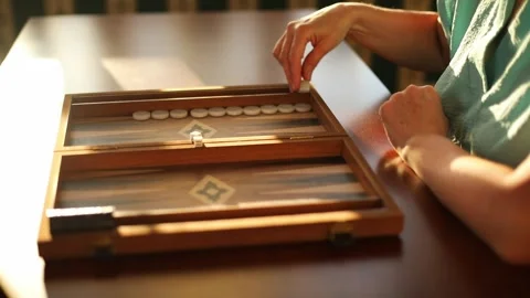 Close Up of Woman Moving Checkers on Backgammon Board 스톡 동영상 332639909