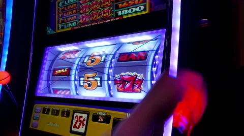 Close up woman playing slot machine inside Hard Rock Casino Stock-Footage 57661153