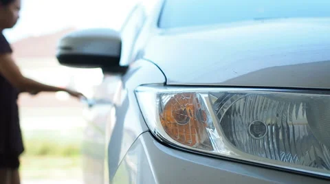 Close up woman press remote button for unlock and opening car door. Stock Footage 56150510
