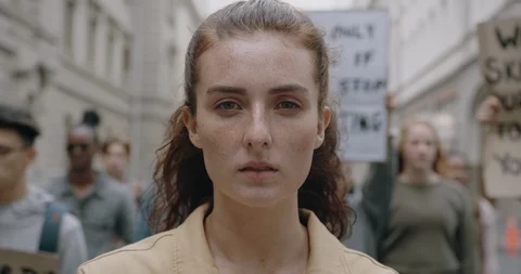 Close up of a woman in a protest Stock Footage 127628484