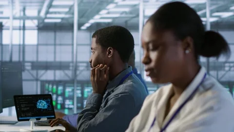 Close up of woman in server hub ensuring optimal system performance Stock Footage 319520514