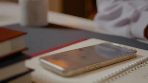 Close up of a woman signing documents using smartphone technology in office Stock Footage 305147468