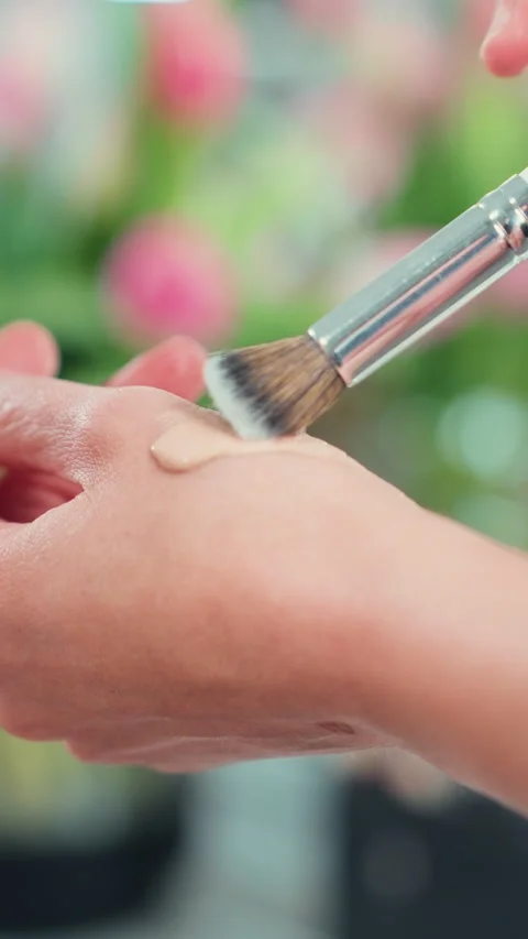 Close-up of woman testing foundation swatch for daily self-care beauty rout.. Stock Footage 332660950