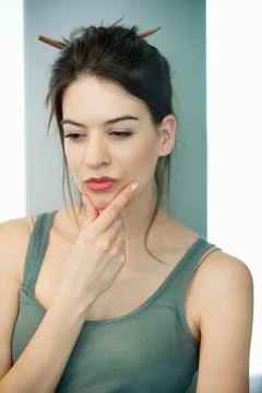Close-up of a woman thinking Stock Photos