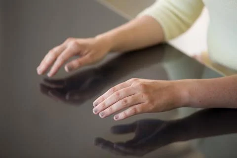 Close up of woman using black interactive panel Stock Photos