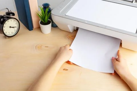 Close up of woman using a printer machine Foto stock