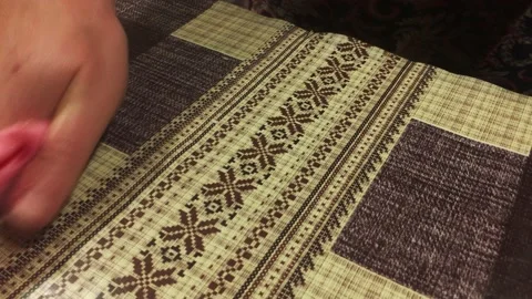 Close-up. Woman wipes the work surface in the kitchen with a damp cloth Video stock 197383578