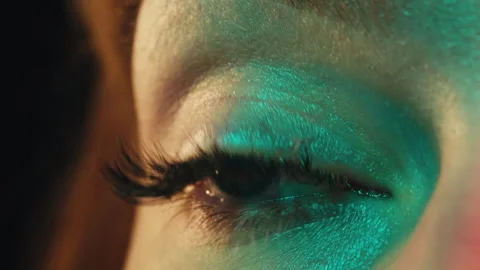 Close-up womans blinking eye with long eyelash and contact lens. Beauty make up Stock Footage 285757481