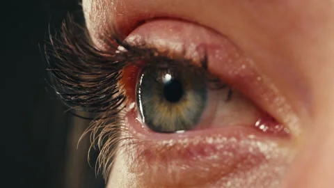 Close-up womans blinking eye with long eyelash and contact lens. Beauty make up Stock-Footage 285757526