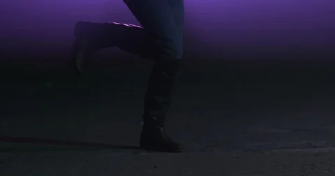 Close up of a woman's boots while dancing in a club Stock Footage 97470447