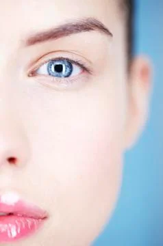 Close-up of woman's eye and lips Stock Photos