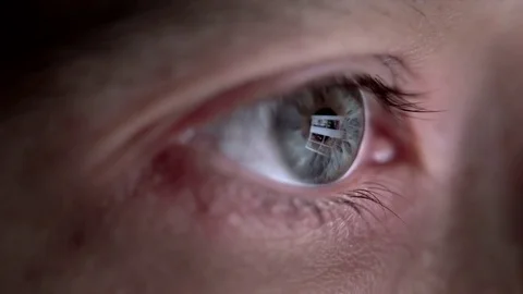 Close up of woman´s eye with reflection of internet. Stock Footage 74625001